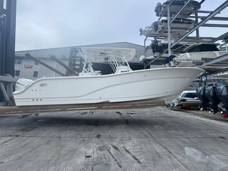Slide: The Image of 2021 Sea Fox 328 Commander boat in a marina storage facility. - 1