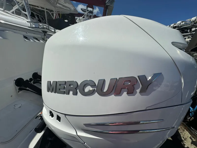 Slide: The Image of Mercury engine on 2021 Sea Fox 328 Commander boat, close-up view. - 7