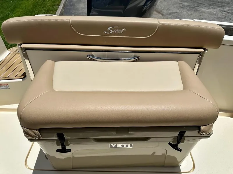 Slide: The Image of 2023 Scout 215 Dorado boat seat with Yeti cooler underneath. - 26