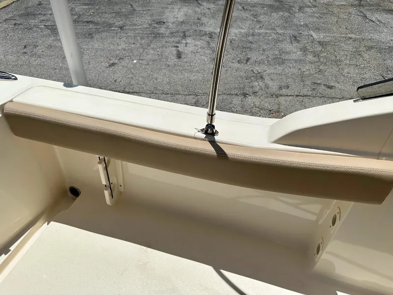 Slide: The Image of 2023 Scout 215 Dorado boat interior with beige seating and stainless steel railing. - 27