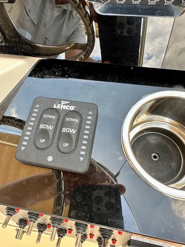 Slide: The Image of Control panel and sink on 2023 Scout 215 Dorado boat. - 38