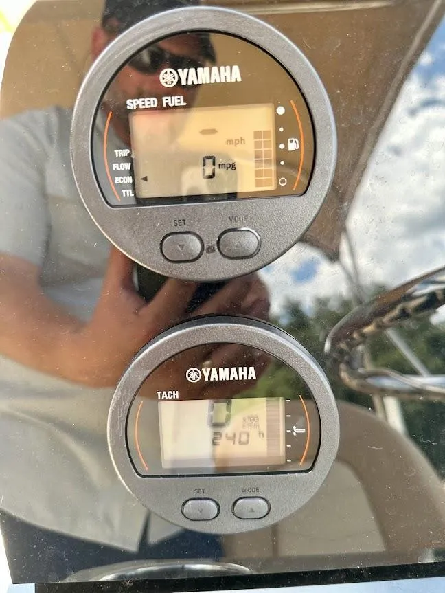 Slide: The Image of Yamaha speed and tachometer gauges on 2023 Scout 215 Dorado boat dashboard. - 46