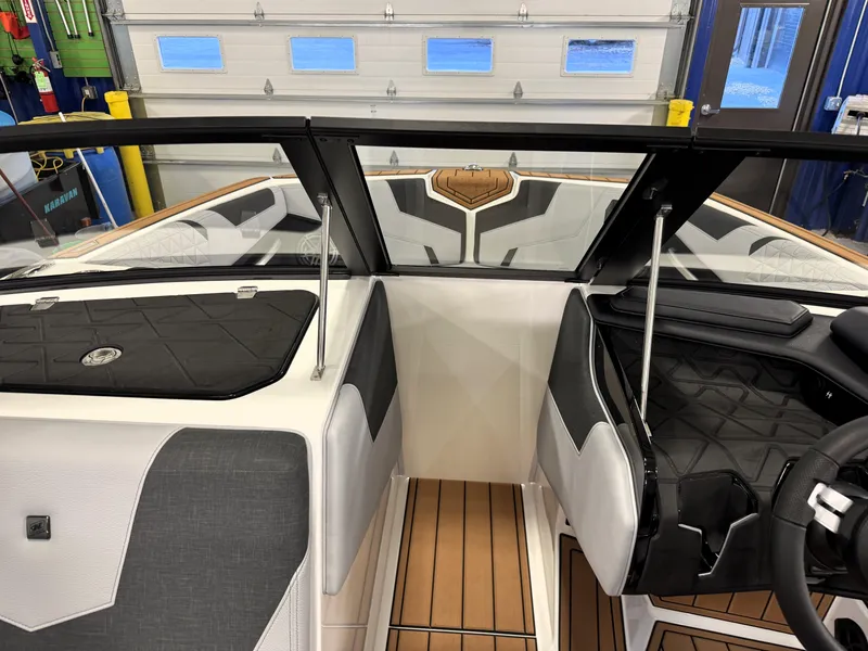 Slide: The Image of 2025 Nautique Super Air Nautique GS20 interior, featuring sleek design and modern dashboard. - 15