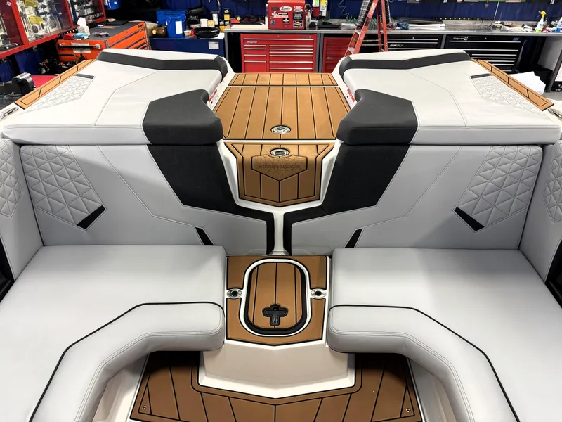 Slide: The Image of 2025 Nautique Super Air Nautique GS20 interior with luxurious seating and modern design. - 22