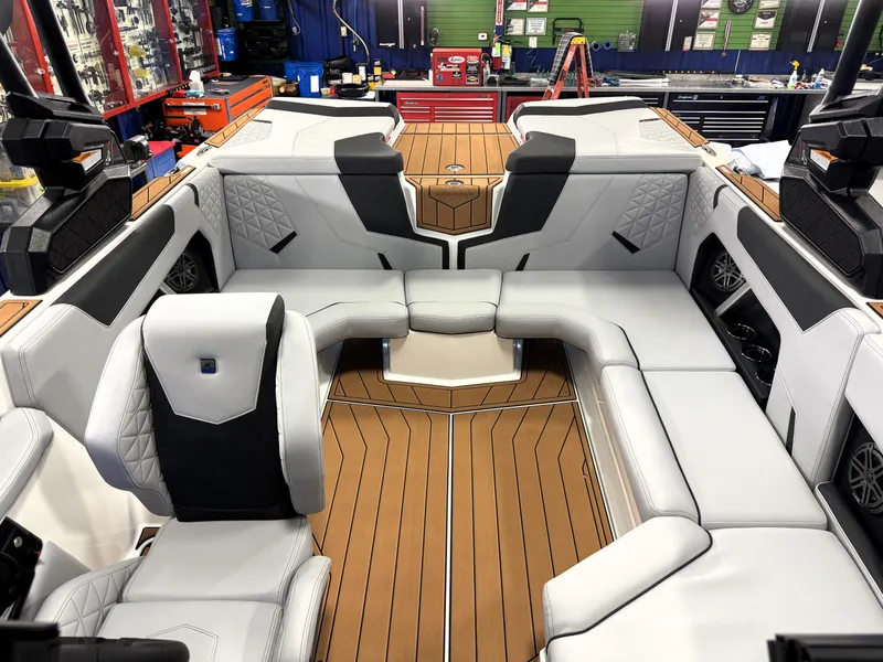 Slide: The Image of 2025 Nautique Super Air Nautique GS20 interior with luxurious seating and modern design. - 6