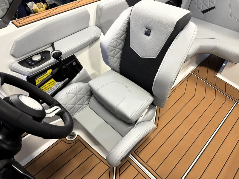 Slide: The Image of 2025 Nautique Super Air Nautique GS20 interior with luxury seating and modern controls. - 9