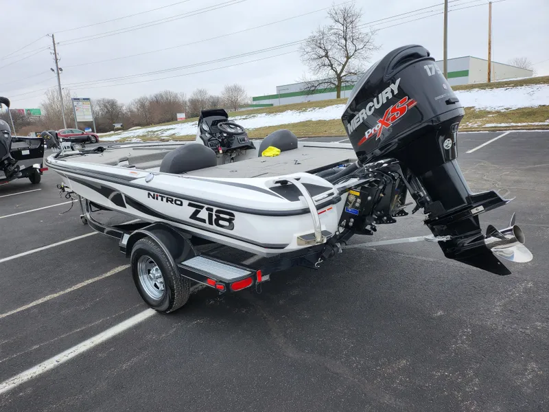 Slide: The Image of 2016 Nitro Z18 boat with Mercury engine in parking lot. - 3
