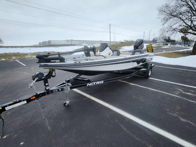 Slide: The Image of 2016 Nitro Z18 boat on trailer in snowy parking lot. - 6