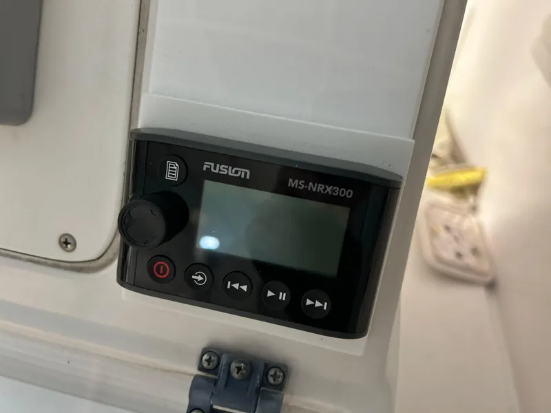 Slide: The Image of Fusion MS-NRX300 stereo system on 2007 Donzi 38 ZF Cuddy boat dashboard. - 9