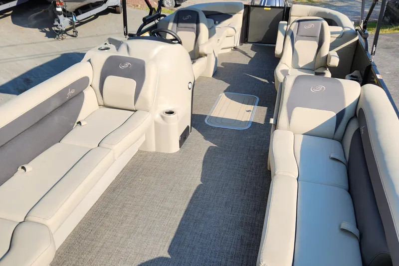 Slide: The Image of 2024 Barletta Aria 24QC pontoon boat interior with spacious seating and modern design. - 4