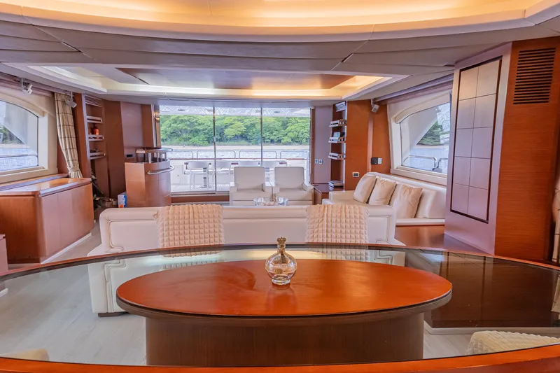 Slide: The Image of Luxurious interior of 2006 Azimut 105 Grande yacht with elegant furnishings and panoramic windows. - 10