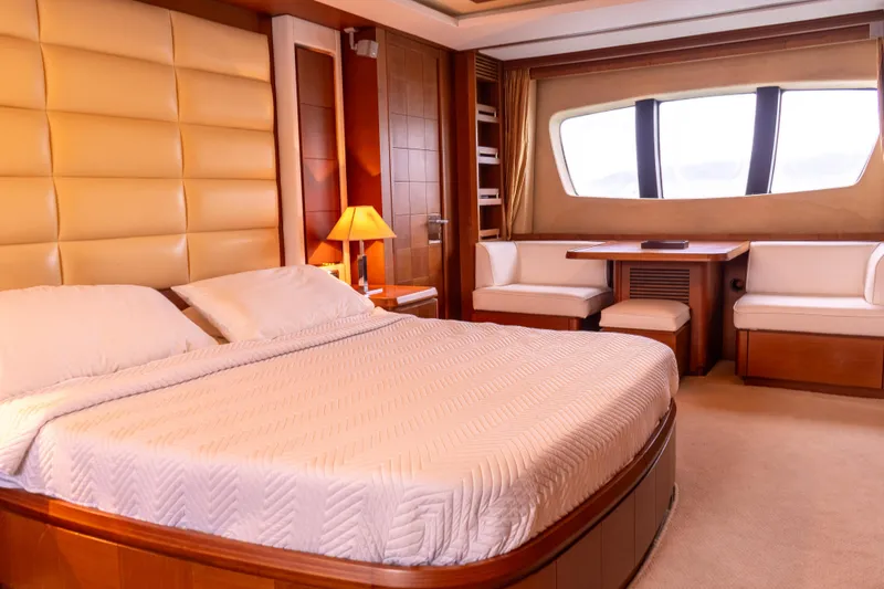Slide: The Image of Luxurious bedroom interior of 2006 Azimut 105 Grande yacht with elegant furnishings. - 22