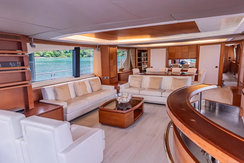 Slide: The Image of Luxurious interior of 2006 Azimut 105 Grande yacht with elegant seating and wooden accents. - 5