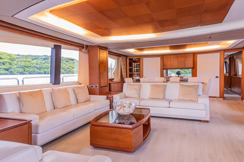Slide: The Image of Luxurious interior of 2006 Azimut 105 Grande yacht with elegant seating and scenic views. - 6