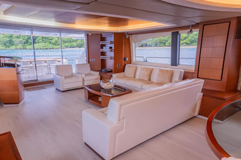 Slide: The Image of Luxurious interior of 2006 Azimut 105 Grande yacht with elegant seating and scenic views. - 9