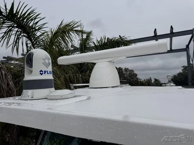 Slide: The Image of Radar and FLIR camera on 2025 Blackfin 332cc boat under cloudy sky. - 34