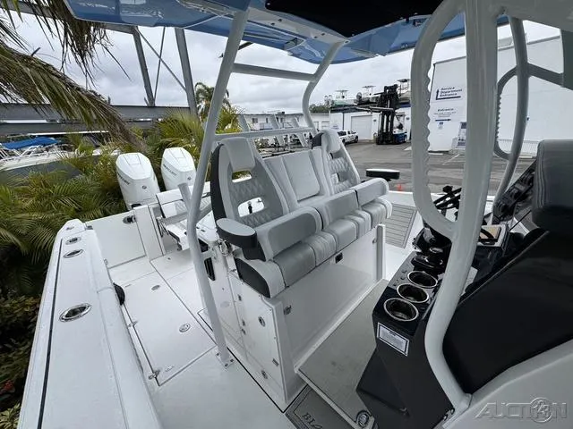 Slide: The Image of 2025 Blackfin 332cc boat interior with seating and control panel. - 38