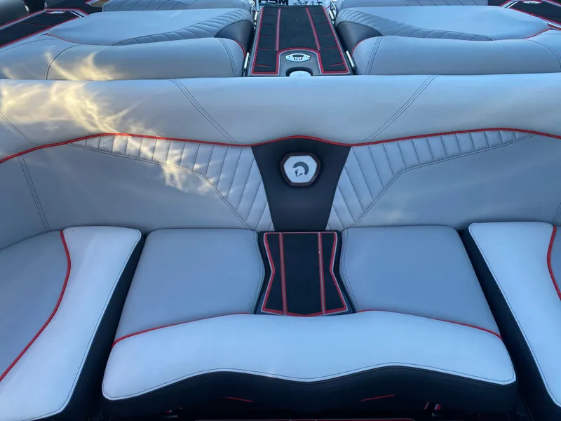 Slide: The Image of 2023 Centurion Fi23 boat interior with stylish gray and red upholstery. - 8