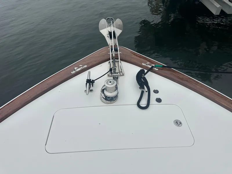 Slide: The Image of Bow of 2017 Viking 55 Convertible yacht with anchor and winch system. - 32