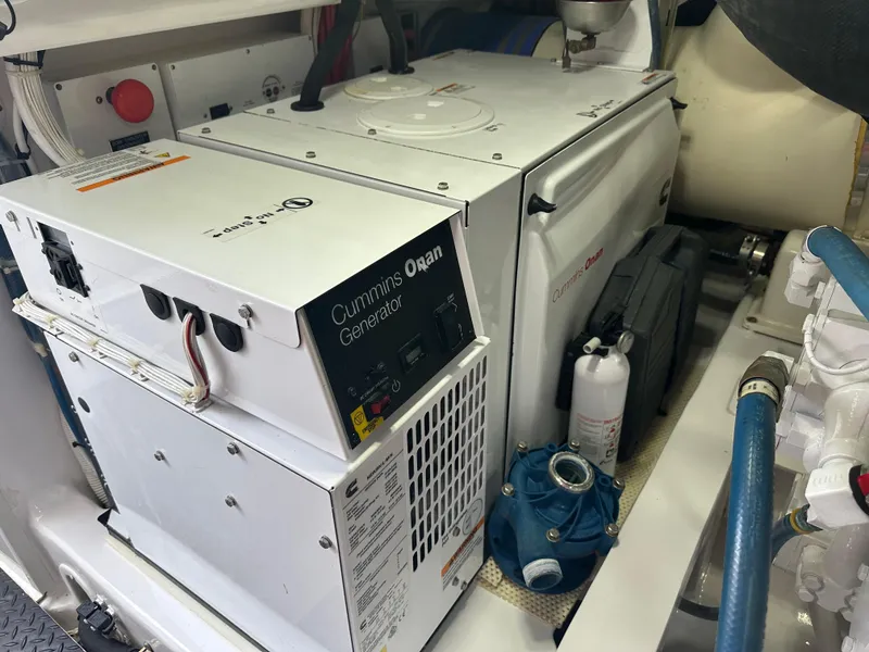 Slide: The Image of Engine room of 2017 Viking 55 Convertible with Cummins Onan generator. - 34
