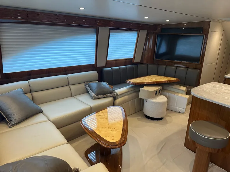 Slide: The Image of Luxurious interior of 2017 Viking 55 Convertible yacht with plush seating and modern decor. - 4