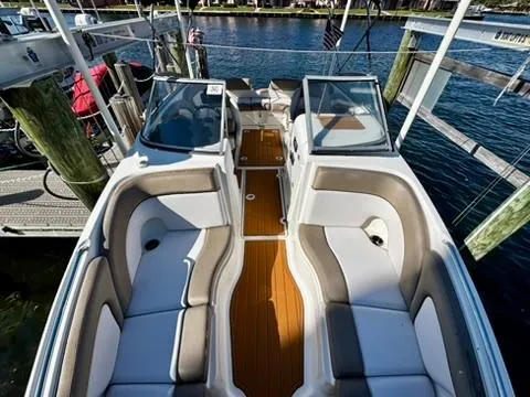 Slide: The Image of 2011 Yamaha Boats SX240 HO interior with spacious seating and sleek design. - 11