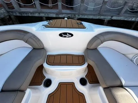 Slide: The Image of 2011 Yamaha Boats SX240 HO interior seating with brown and gray accents. - 13