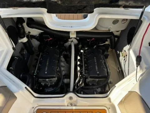 Slide: The Image of Engine compartment of a 2011 Yamaha Boats SX240 HO, showcasing dual engines. - 17