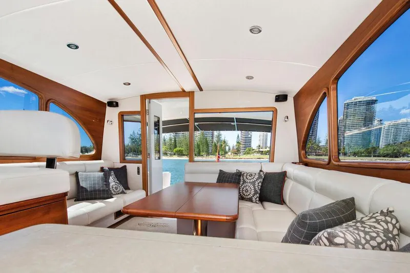 Slide: The Image of Luxurious interior of 2026 Palm Beach Motor Yachts PB42 with elegant seating and scenic views. - 2