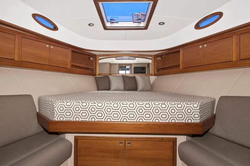 Slide: The Image of Luxurious cabin interior of 2026 Palm Beach Motor Yachts PB42 with elegant wood finish. - 4
