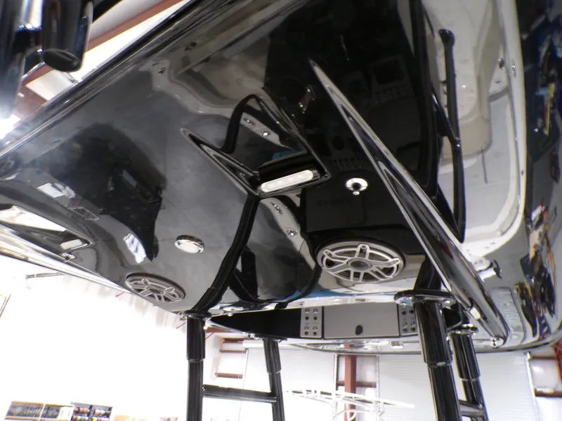 Slide: The Image of 2024 ShearWater 250 SS Carolina boat seats in a showroom setting. - 21