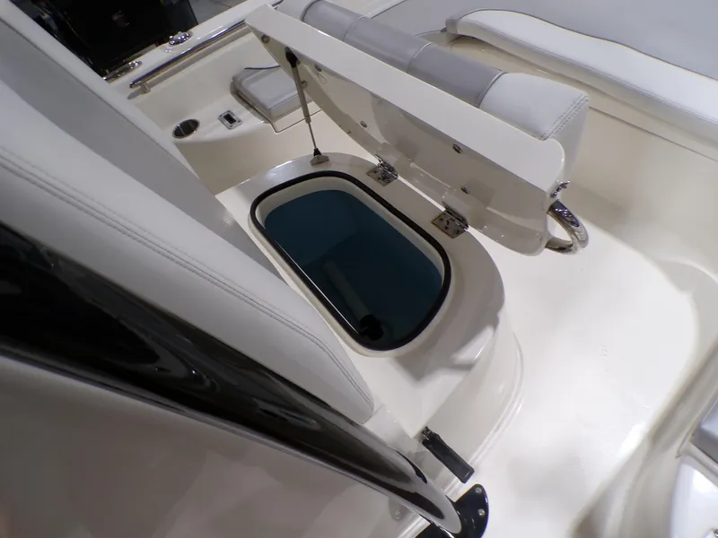Slide: The Image of 2024 ShearWater 250 SS Carolina boat dashboard with Garmin navigation system. - 30