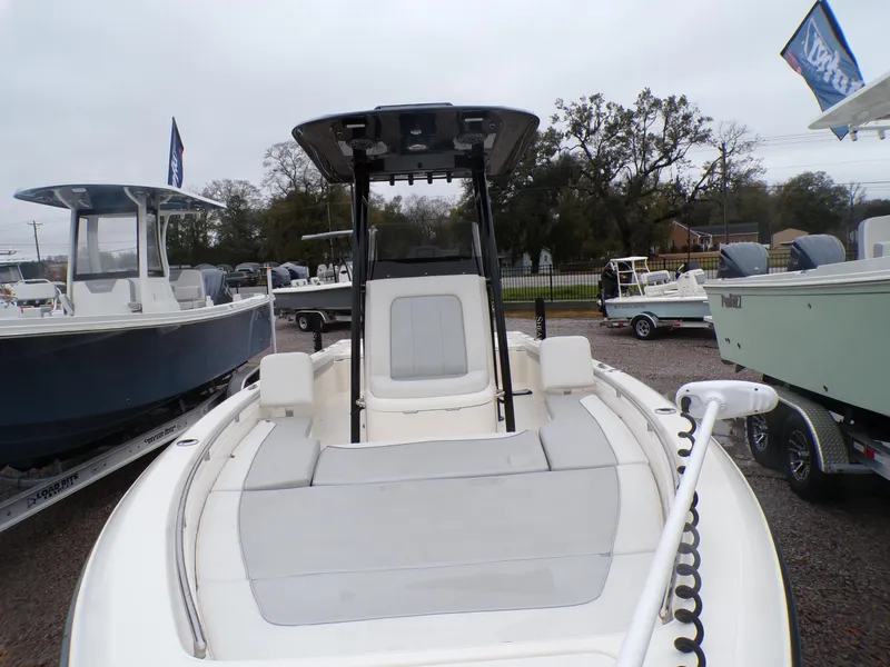 Slide: The Image of 2024 ShearWater 250 SS Carolina boat displayed in a dealership lot. - 34