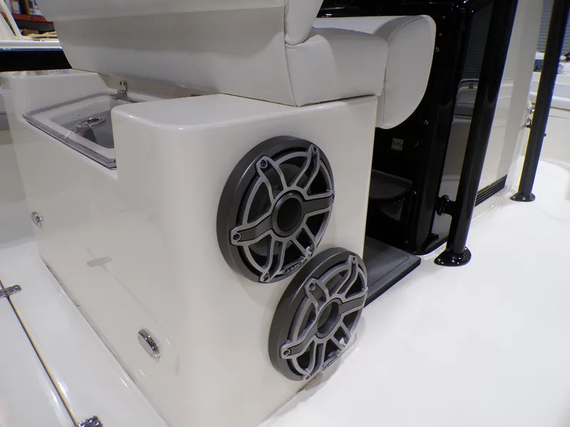 Slide: The Image of 2024 ShearWater 250 SS Carolina boat on trailer in warehouse setting. - 9