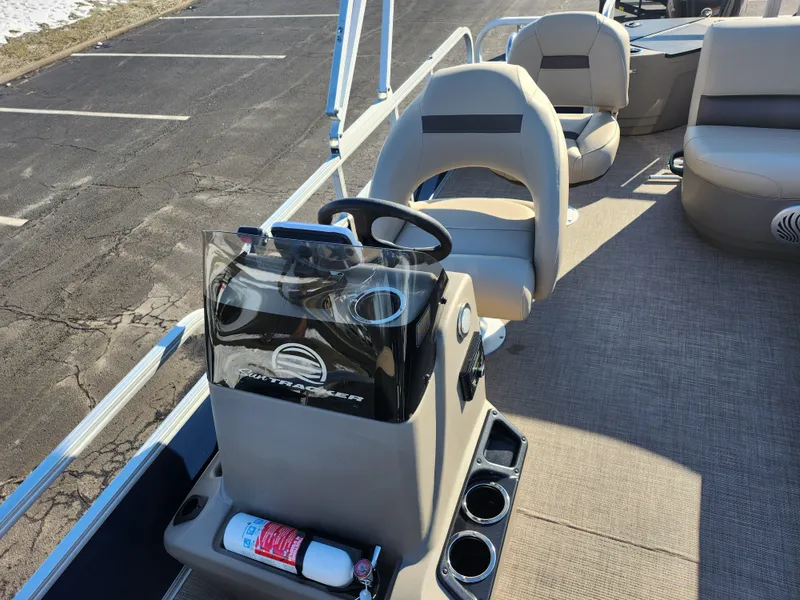 Slide: The Image of 2023 Sun Tracker Bass Buggy 18 DLX pontoon boat interior with steering console. - 12
