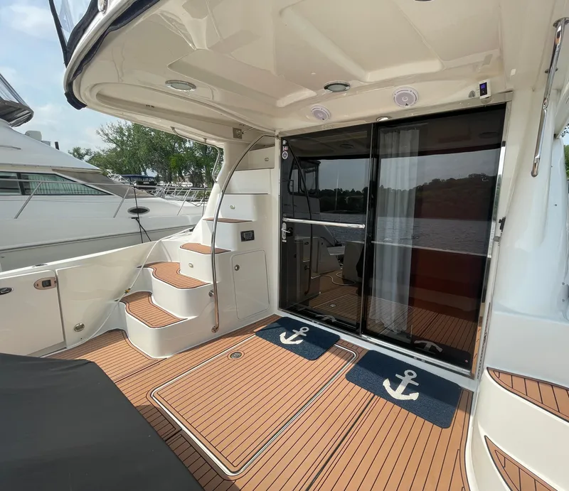 Slide: The Image of 2005 Sea Ray 500 Sedan Bridge yacht with teak deck and sliding glass doors. - 19
