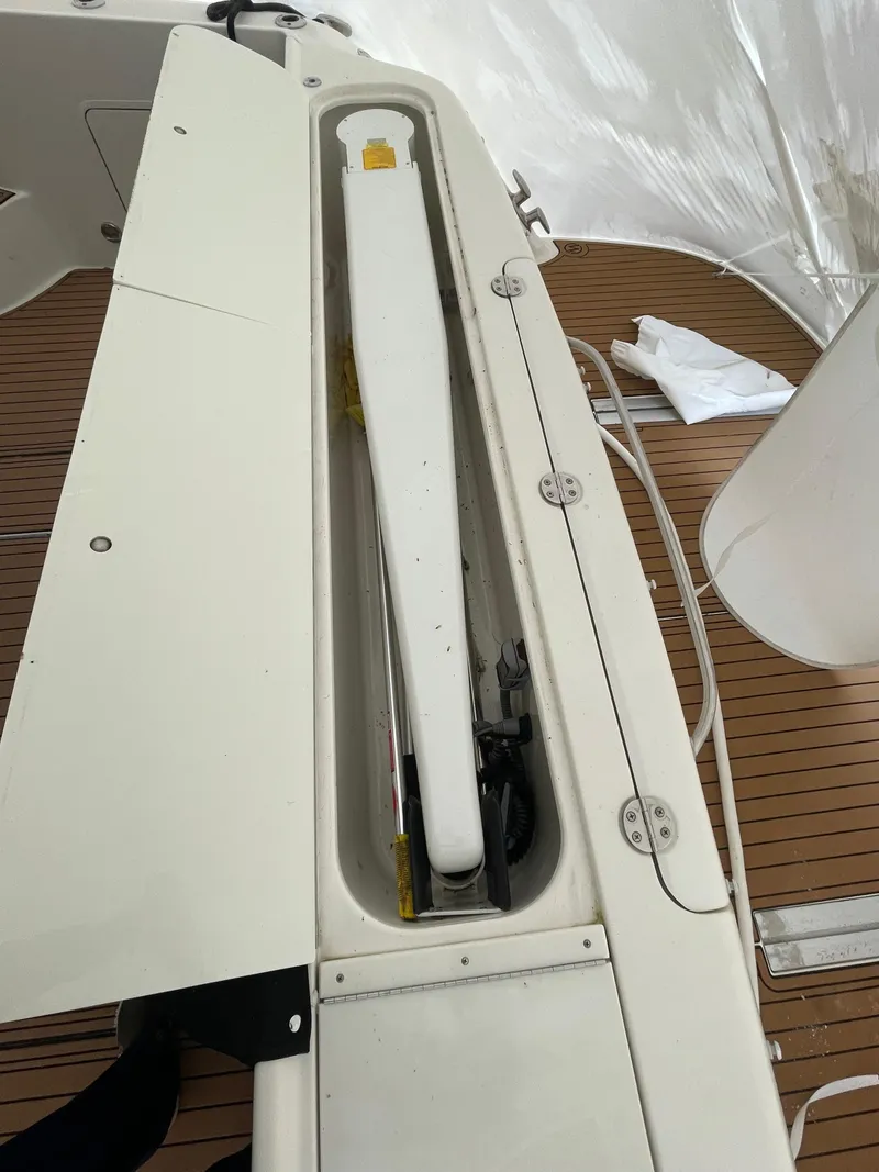 Slide: The Image of 2005 Sea Ray 500 Sedan Bridge deck detail with storage compartment. - 21