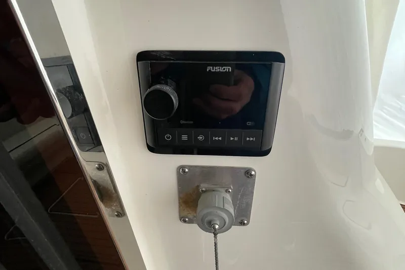 Slide: The Image of Fusion audio control panel on 2005 Sea Ray 500 Sedan Bridge yacht. - 24