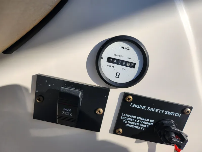 Slide: The Image of Control panel of 2008 Glastron GT 205 Ski & Fish boat with engine safety switch. - 16