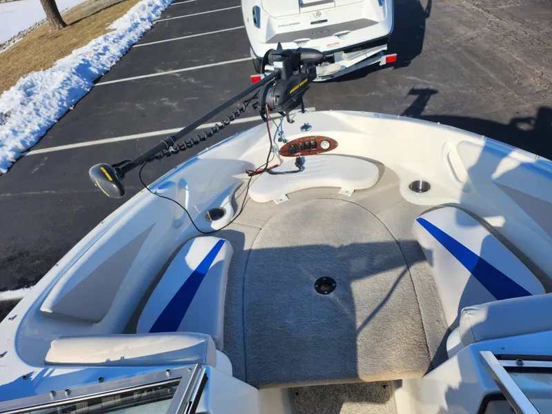 Slide: The Image of 2008 Glastron GT 205 Ski & Fish boat interior with seating and trolling motor. - 19