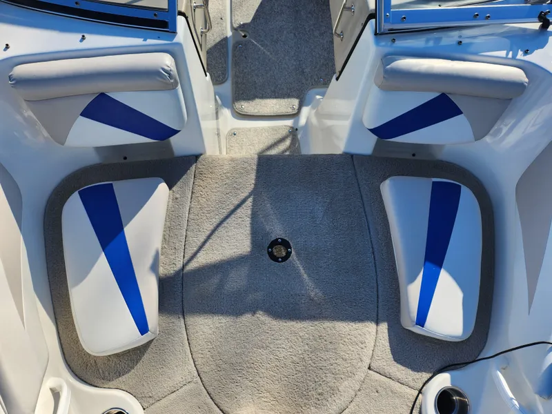 Slide: The Image of 2008 Glastron GT 205 Ski & Fish boat interior with blue and white seating. - 21