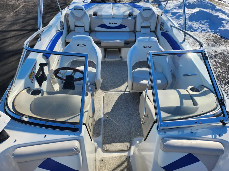 Slide: The Image of 2008 Glastron GT 205 Ski & Fish boat interior with seating and steering wheel. - 22