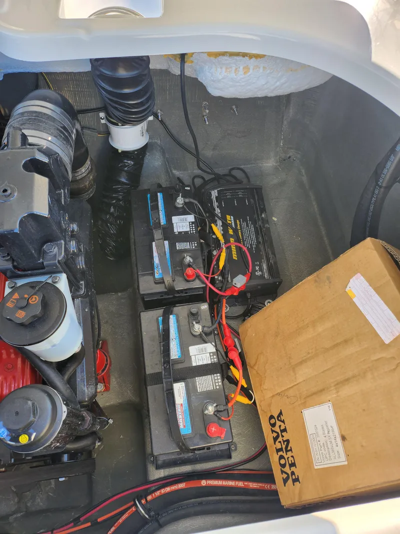 Slide: The Image of 2008 Glastron GT 205 Ski & Fish boat engine compartment with batteries and Volvo Penta box. - 26