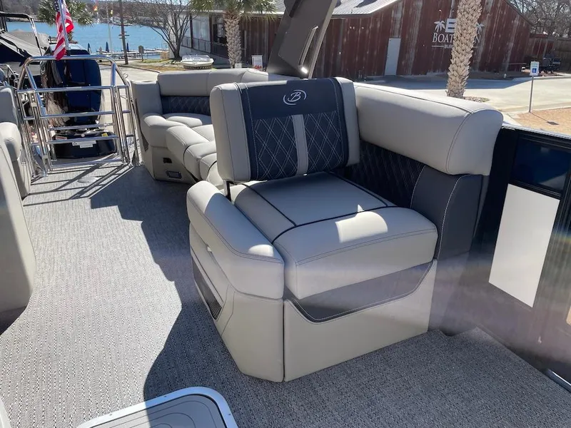 Slide: The Image of 2025 Barletta Lusso 25QSS pontoon boat interior with luxurious seating and elegant design. - 10