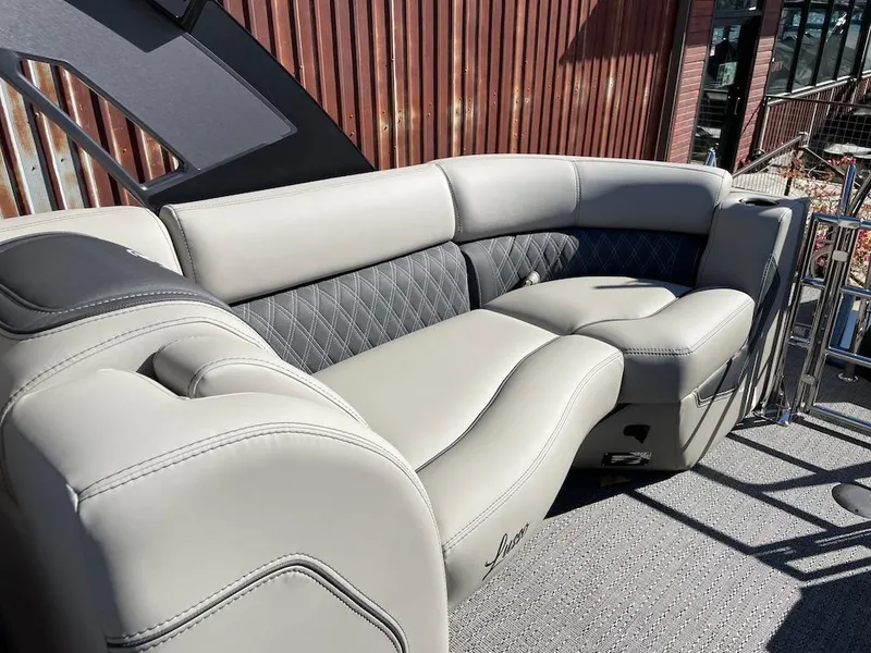 Slide: The Image of Luxurious seating on 2025 Barletta Lusso 25QSS pontoon boat, featuring elegant upholstery. - 13