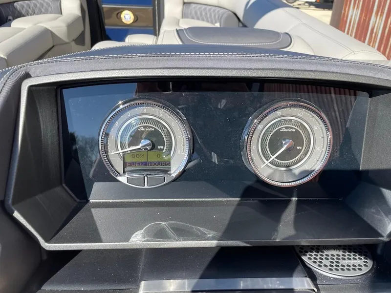 Slide: The Image of Dashboard of 2025 Barletta Lusso 25QSS with modern gauges and sleek design. - 16