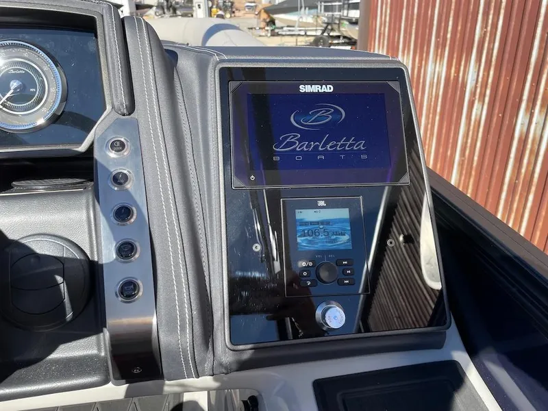 Slide: The Image of Dashboard of 2025 Barletta Lusso 25QSS boat with Simrad display. - 17