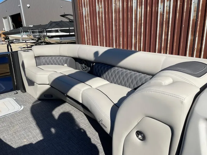 Slide: The Image of 2025 Barletta Lusso 25QSS pontoon boat with luxurious seating and modern design. - 8