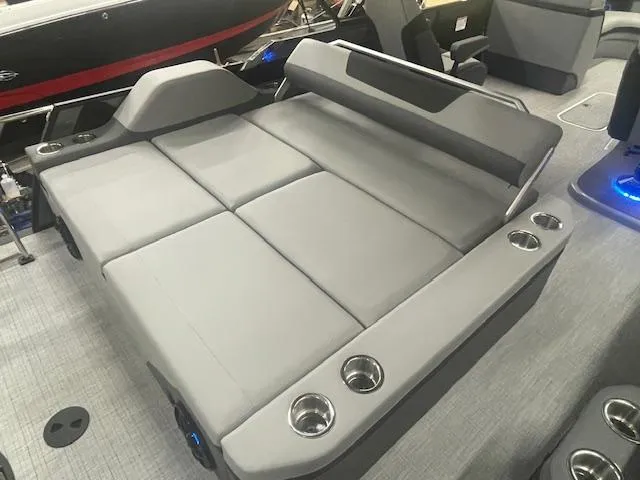 Slide: The Image of Luxurious seating area on 2025 South Bay 500 boat with cup holders. - 14