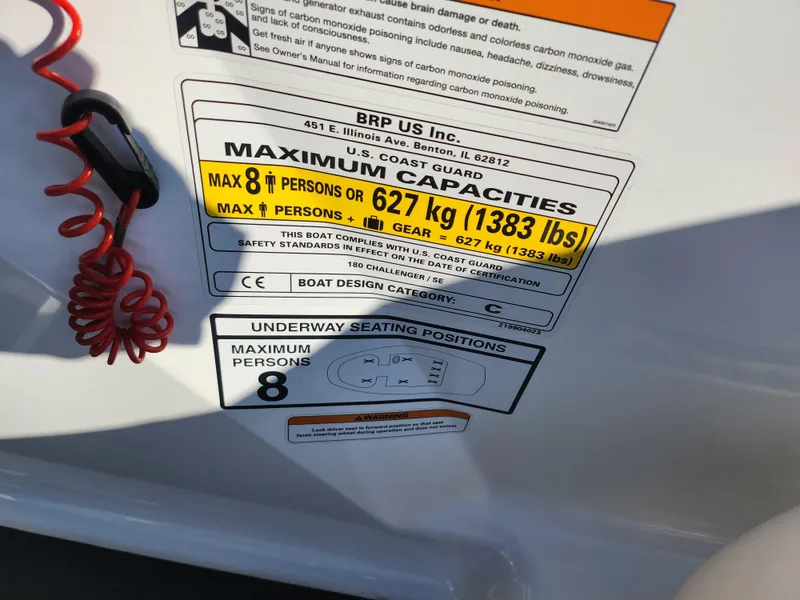 Slide: The Image of 2012 Sea-Doo 180 Challenger SE capacity label, max 8 persons or 627 kg (1383 lbs). - 13